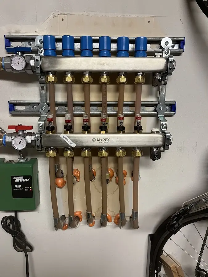 Plumber performing Gas Leak Detection at a residential property in Northampton